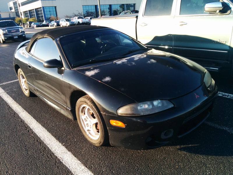 Allegedly Mitsubishi actually issued a recall for the black paint on these cars. This one clearly never had that service done.